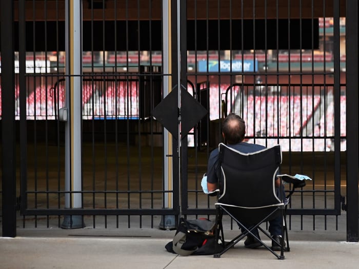 MLB fan waiting outside ballpark